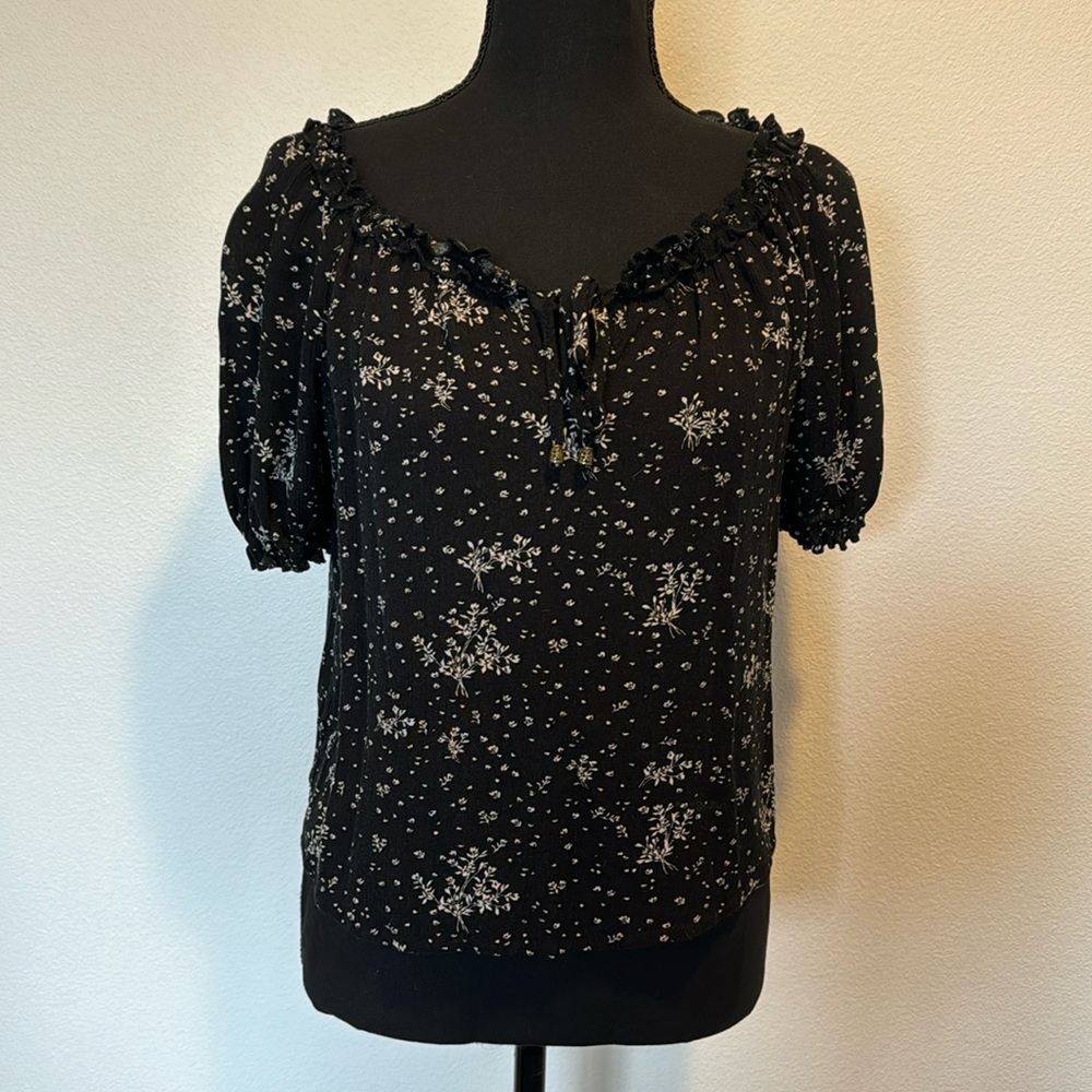 Rewind blouse black with white flowers size small.